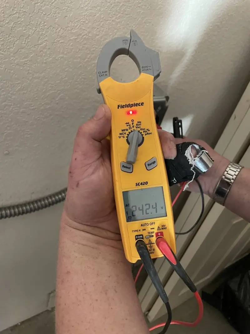 Voltage testing with clamp meter during Hot Tub / Pool Electrical Wiring in Oak Brook